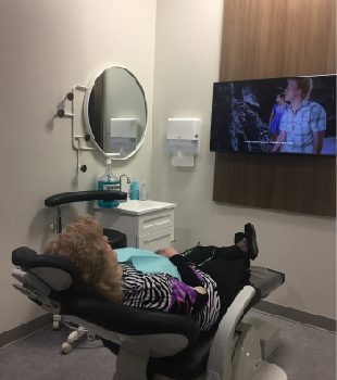 Patient lying Down in the Dental Chair